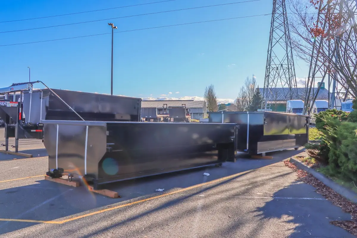 Roll-off dumpster ready for waste disposal at job site for 4 Yard Dumpster Rental in San Martin